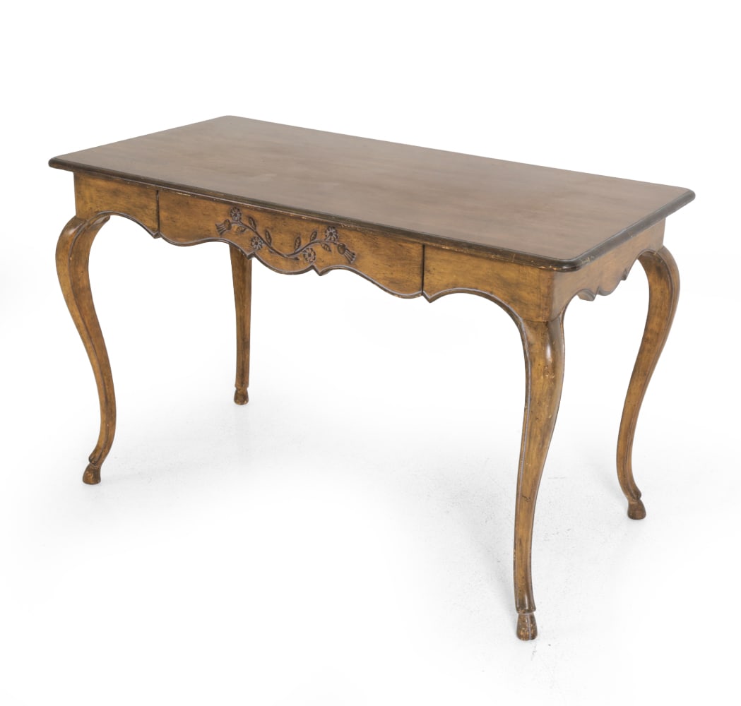 LEWIS MITTMAN FRENCH PROVINCIAL STYLE DESK: Features a shaped top with scalloped apron and carved details. Mid-20th century. Dimensions: H 30 " x W 48 " x D 24 " Condition: Wear consistent with age and use. Scuffs, some scratches to top