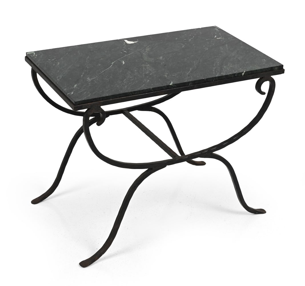 WROUGHT IRON MARBLE TOP SIDE TABLE: Dark green marble top and distinctive wrought iron scrolled base. Dimensions: H 19" x W 24" x D 14.25" Condition: Wear consistent with age and use. Scuffs, rubs, oxidizing to base.