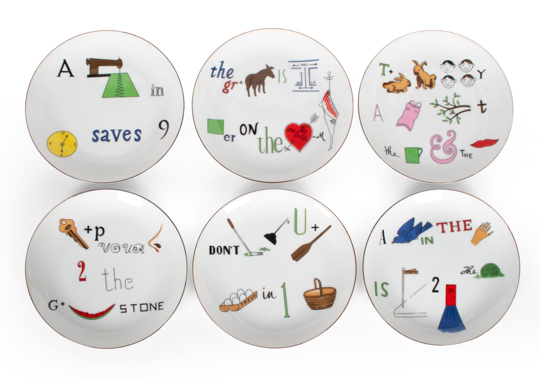 GROUPING OF TASTE SETTER SIGMA PICTOGRAM PLATES: (6) Taste Setter pictogram puzzle plates. Marked on underside. Dimensions: H 1" x Dia 7.5" Condition: Rubs to gilded edges, roughness to edge of one plate, wear consistent with age and use.