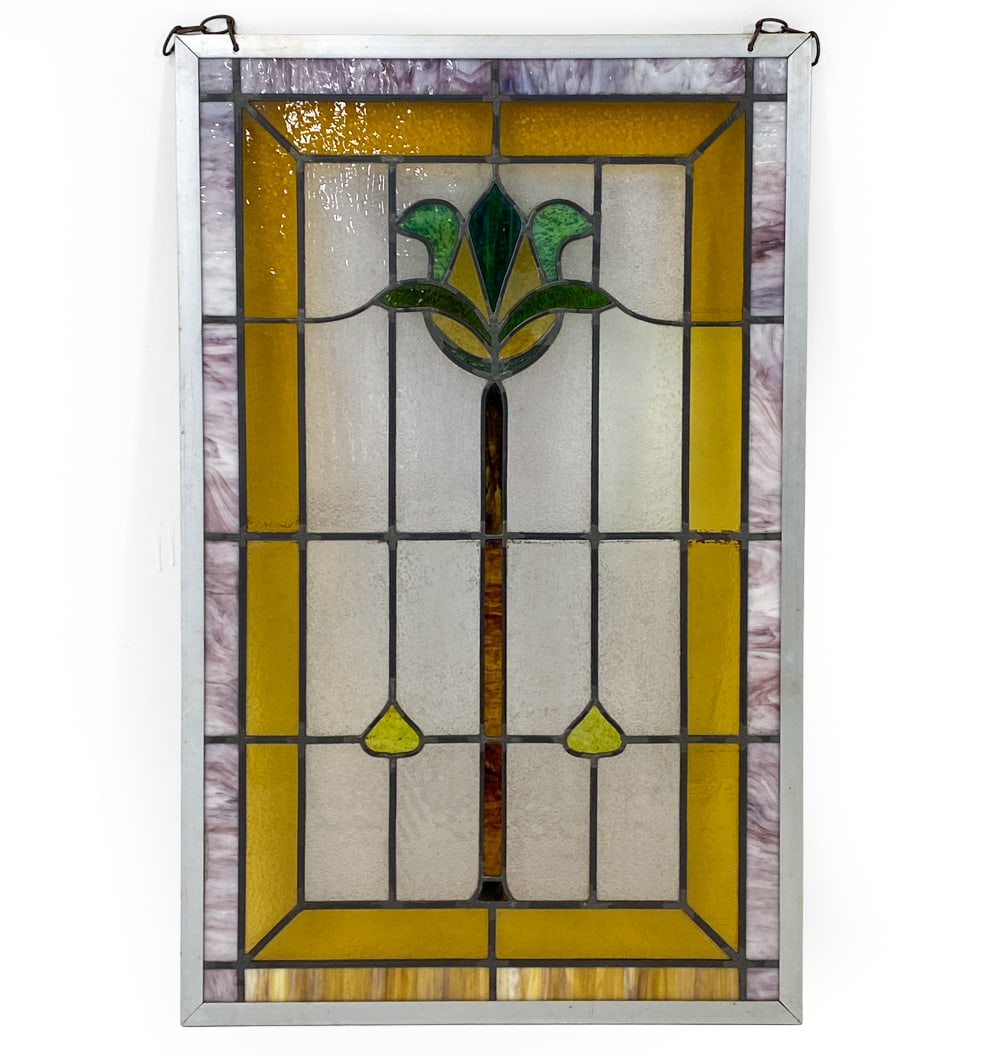 VINTAGE STAINED GLASS WINDOW: Appears to be reframed. Dimensions: H 43" x W 27" Condition: Couple cracks to glass. Wear consistent with age.