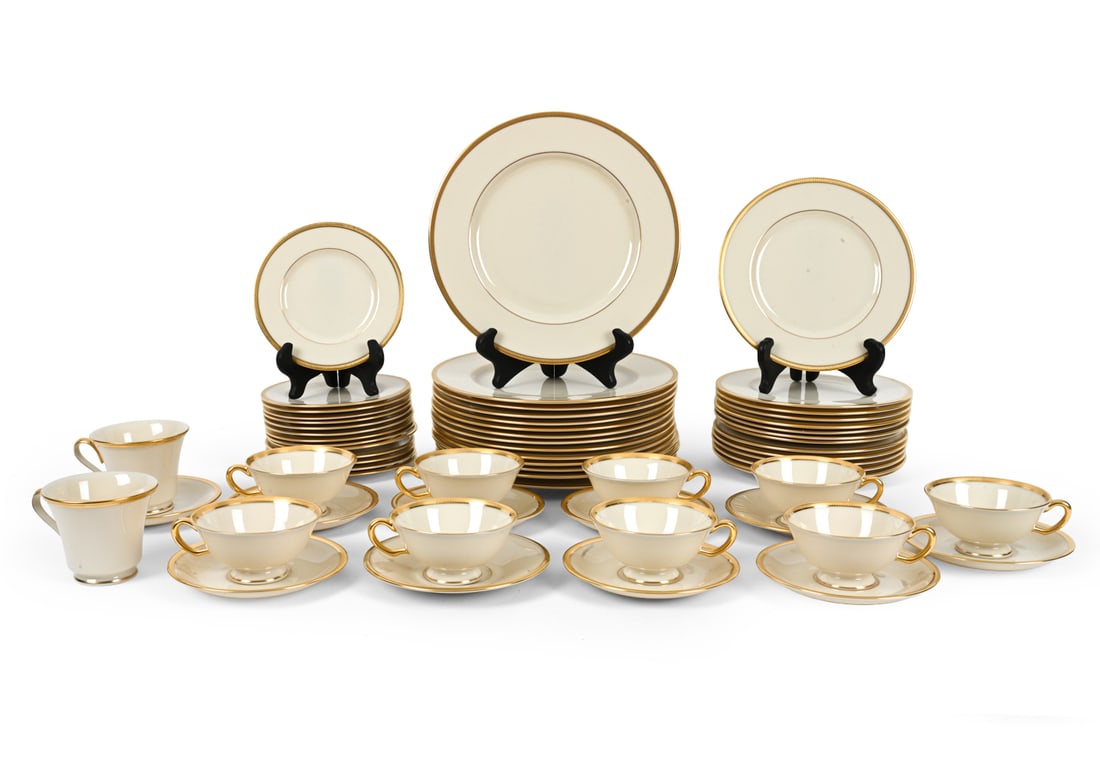 LENOX "ETERNAL DIMENSIONS" COLLECTION CHINA SET: All are stamped underneath. Porcelain with 24K gold gilding. 20th century. Includes 9 teacups, 10 saucers. 14 bread plates, 14 salad plates, 14 dinner plates and 2 coffee cups. Dimensions: (largest pl