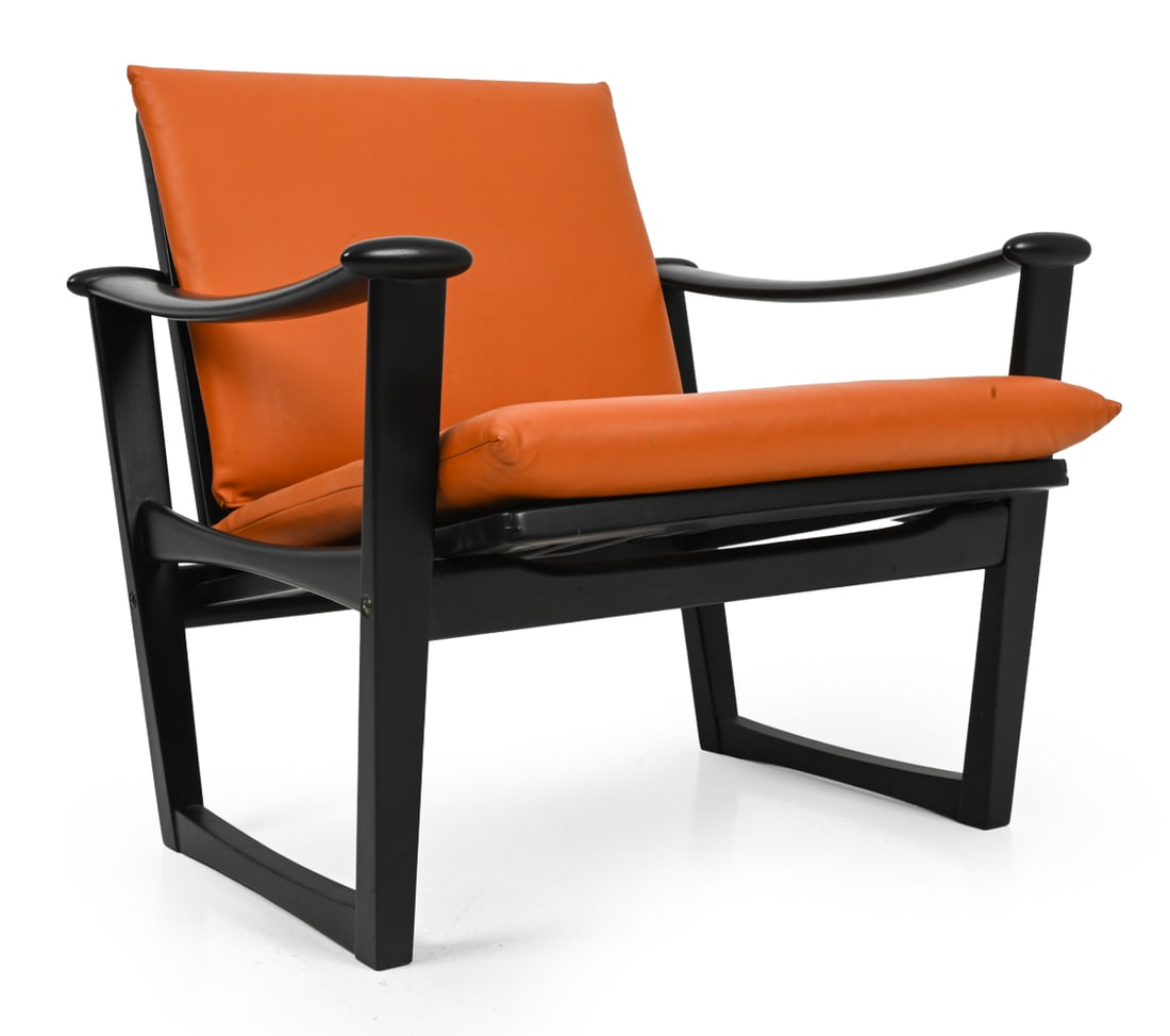 M. NISSEN FOR PASTOE MODEL 65 LOUNGE CHAIR 1970S: Black lacquer frame with leather cushions. Apparently unmarked. Netherlands, circa 1970s. Dimensions: H 28" x W 27" x D 28.5" x SH 15" Condition: Few small nicks and scuffs to frame; one small loss