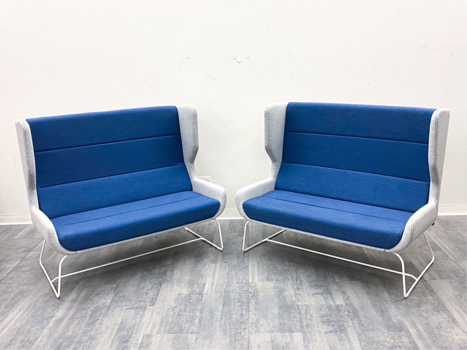 PAIR NAUGHTONE HERMAN MILLER HUSH HIGH BACK SOFAS - 2