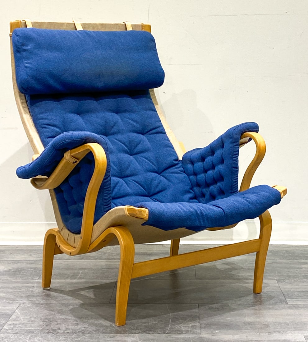 BRUNO MATHSSON FOR DUX "PERNILLA" LOUNGE CHAIR: Model Pernilla armchair. Bentwood beech frame and blue upholstered cushions on canvas slings with leather straps. Marked to underlining and frame. Sweden, circa 1970s. Dimensions: H 39.5 " x W 35.5" x