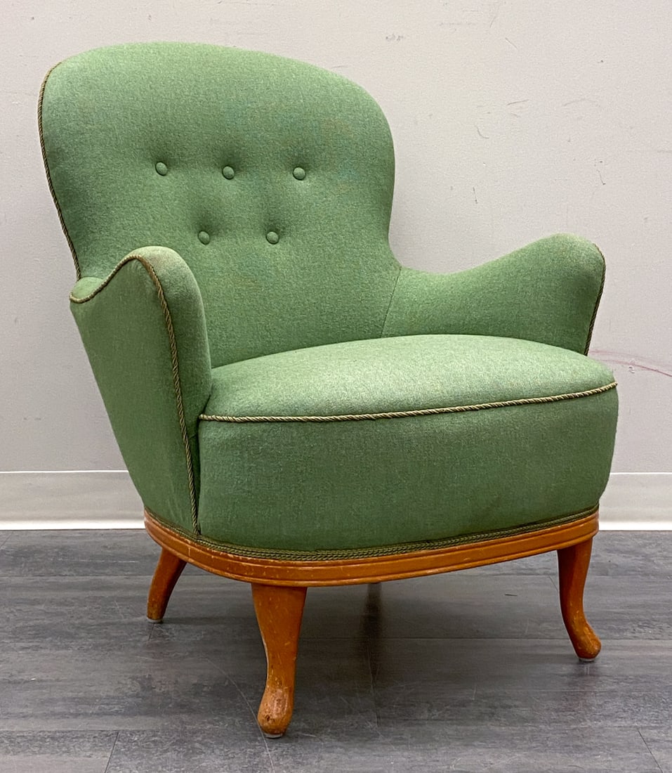 MALMSTEN STYLE SWEDISH LOUNGE CHAIR C. 1940S: Tufted backrest and braided detail in green upholstery. Stained beech legs. Sweden, circa 1940s. Dimensions: H 33.5" x W 28" x D 32" SH 19". Condition: Wear consistent with age and use. Minor soiling 