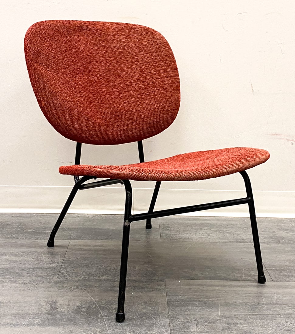 SCANDINAVIAN EASY CHAIR C. 1960S: Painted iron frame and red upholstery. circa 1960s. Dimensions: H 28.5" x W 22" x D 27.5" SH 14" Condition: Discoloration, Fading. Wear consistent with age and use. Scratches, minor paint loss to fram