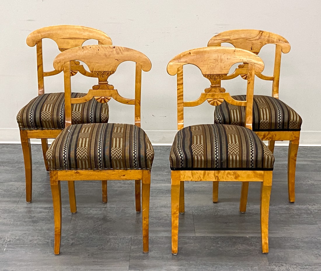 (4) BIEDERMEIER STYLE SWEDISH BIRCH DINING CHAIRS: Carved birch frame and striped upholstery. Sweden, circa 1920s. Dimensions: H 32.5" x W 16.6" x D 16" x SH 18" Condition: Wear consistent with age and use. Scuffs, rubs, fading, discoloration to