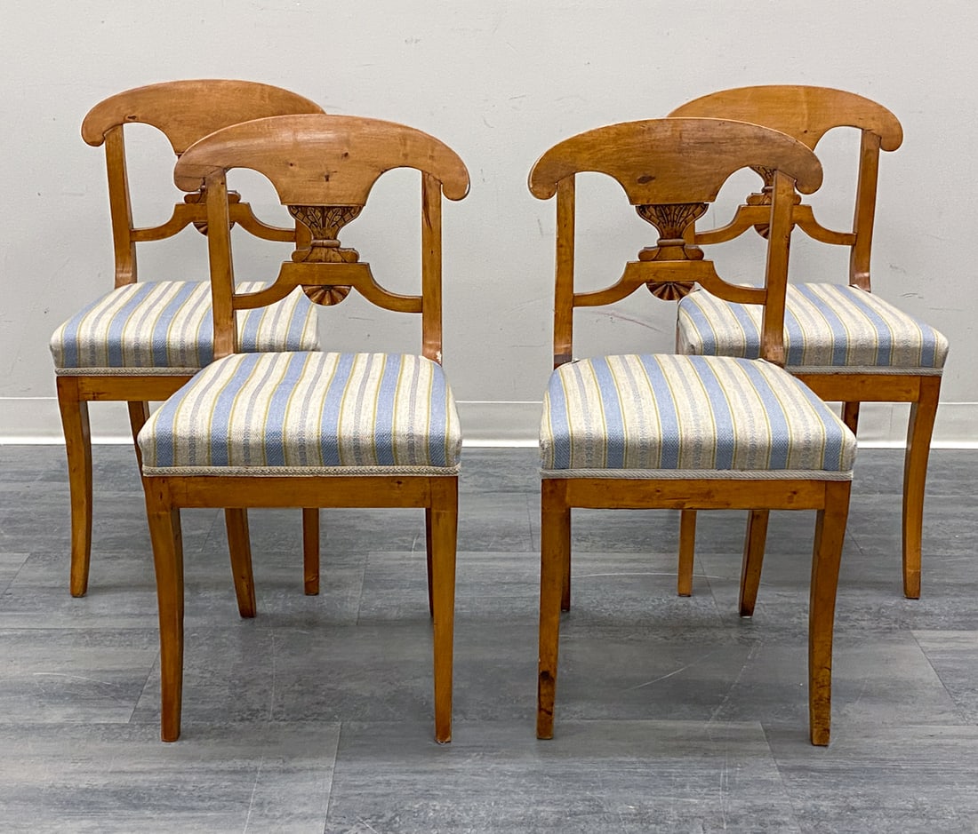 (4) BIEDERMEIER STYLE SWEDISH BIRCH DINING CHAIRS: Carved birch frame and striped upholstery. Sweden, circa 1920s. Dimensions: H 32.5" x W 16.6" x D 16" x SH 18" Condition: Wear consistent with age and use. Scuffs, rubs, minor soiling spots,