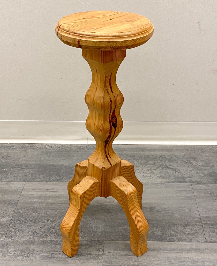 SWEDISH PINE PEDESTAL PLANT STAND C. 1960S: Dimensions: H 25.5" x Dia 13" Condition: Wear consistent with age and use. Minor soiling spots to base. Fading, scuffs, nicks.