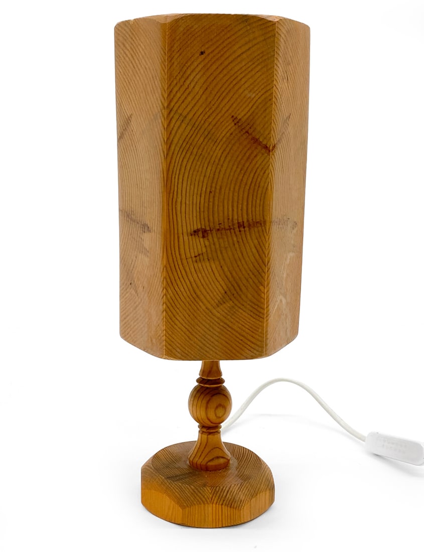 LEIF WIKNER SWEDISH PINE TABLE LAMP C. 1970S: Marked to shade. Sweden, circa 1970s. Dimensions: H 13" x Diameter 5" Condition: Wear consistent with age and use. Untested European plug. Scuffs, rubs, fading, light scratches.