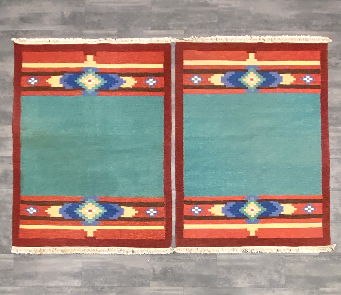 PAIR OF ROLLAKAN SWEDISH FLATWEAVE RUGS 1960S: (2) Rugs. Sweden, circa 1960s. Dimensions: H 82" x W 54.5" Condition: Wear consistent with age and use. Fading, soiling to surface, discoloration to fringe.