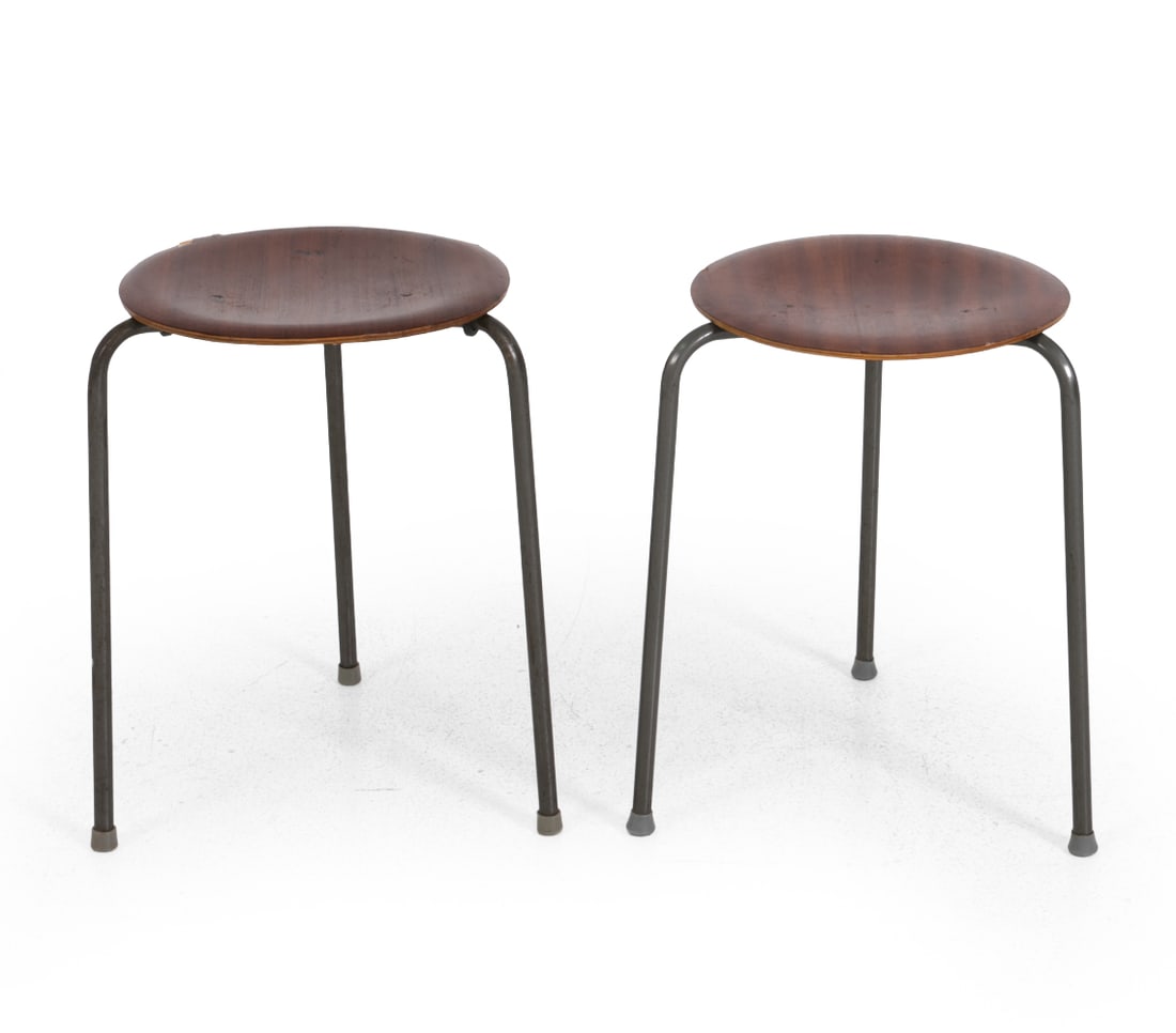 PAIR STYLE OF ARNE JACOBSEN DANISH TEAK STOOLS: Teak seat with metal frame. Denmark, circa 1960s. Dimensions: H 17.5" x W 13" Condition: Scuffs, discoloration, separation of wood, chips and loss to finish. Wear consistent with age and use. F134
