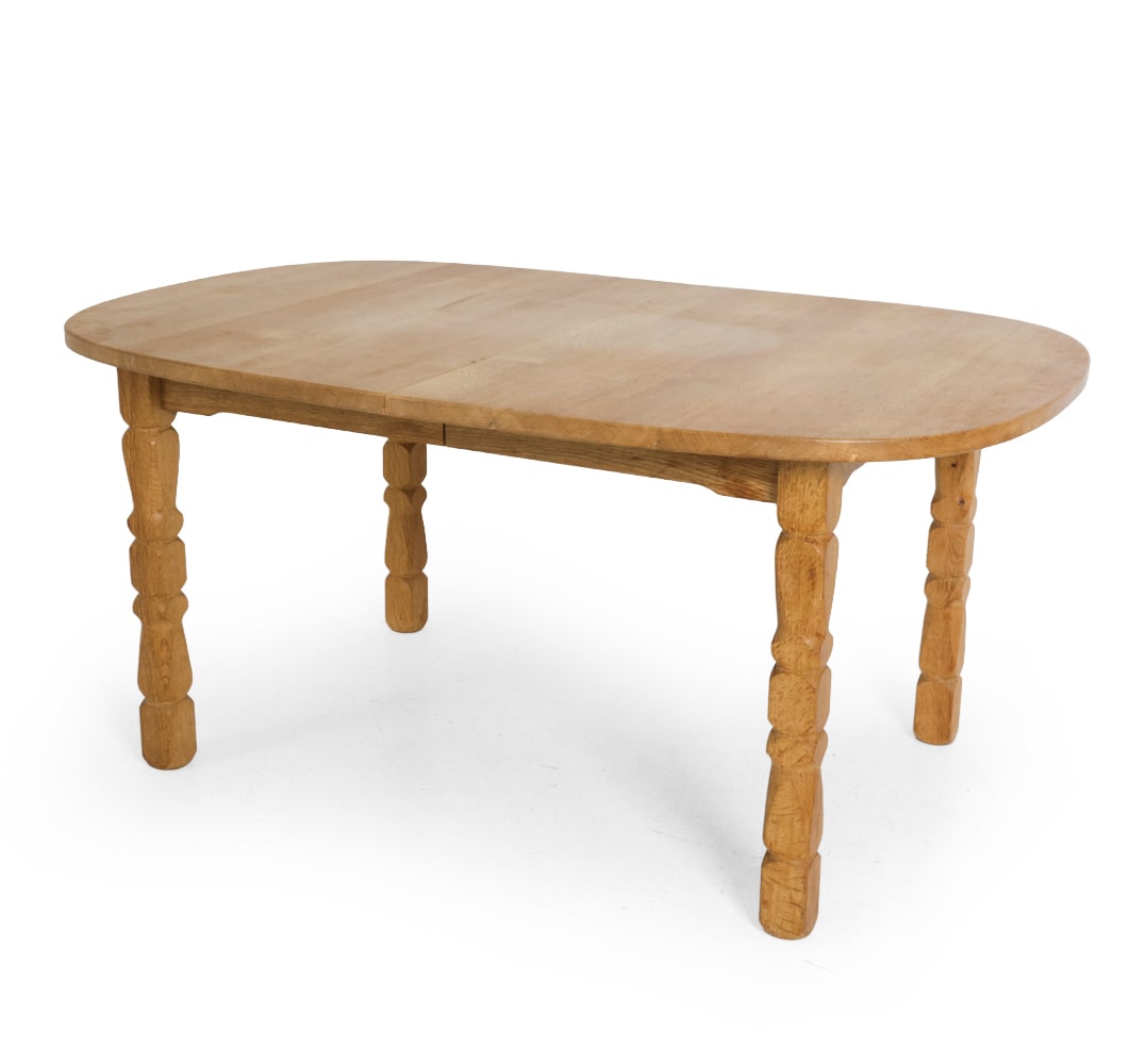STYLE OF KJAERNULF DANISH OAK DINING TABLE 1960S: (2) Leaves Included. Oak frame. Denmark, circa 1960s. Dimensions: H 29.25 " x W 63 " x D 41.5 " (Leaf) W 19.75 " Condition: Light surface wear consistent with age and use. Few scratches and scuffs. F1