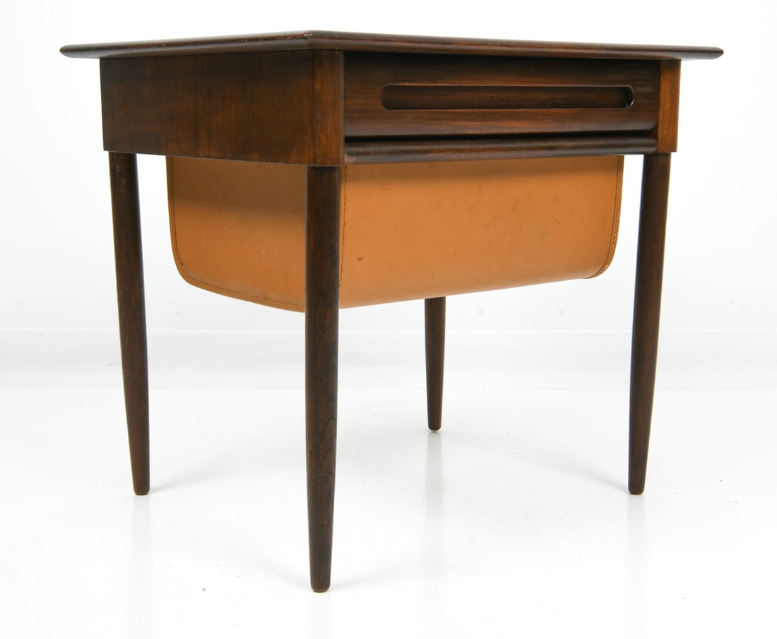 KARL EDVARD KORSETH TEAK & LEATHER SEWING TABLE: Apparently unmarked. Denmark, circa 1960s. Dimensions: H 20.5" x W 22.5" x D 18.5". Condition: Scuffs, dings, and scratches to wood. Wear consistent with age and use. F177