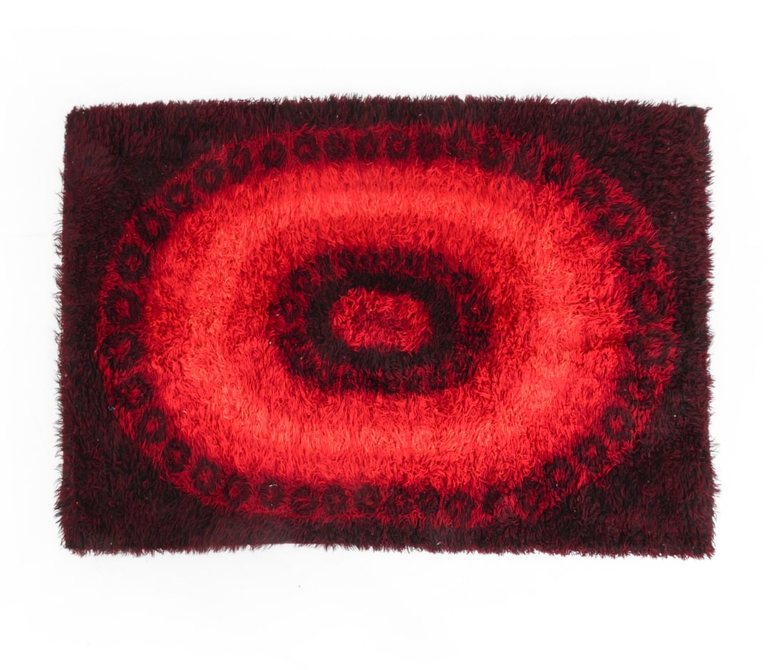DANISH RYA WOOL RUG C. 1970S: Multi-colored wool with fringe at the edges. Denmark, circa 1970s. Dimensions: L 55 " x W 77 " Condition: Wear consistent with age and use. Minor fraying. F051