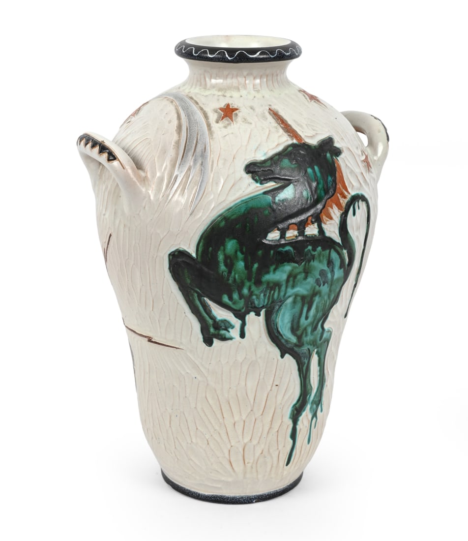 HEDEBO KERAMIK UNICORN CERAMIC VASE C. 1970S: Signed on bottom "Hedebo" with additional writing. Ceramic with multi-colored glaze and carved unicorn design. Denmark, circa 1970s. Dimensions: H: 20.5" x Dia: 15" Condition: Cracks to handle.