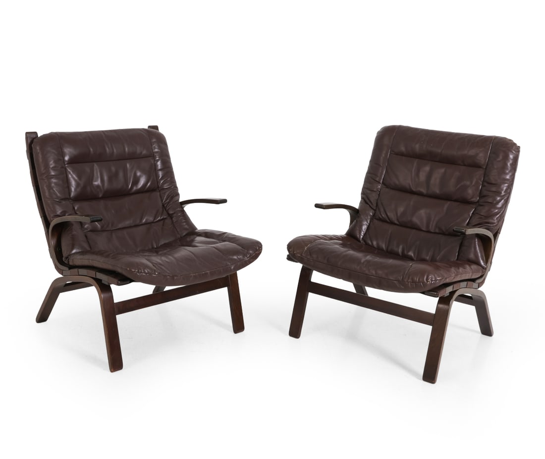 PAIR OF FARSTRUP "MILJO" LEATHER LOUNGE CHAIRS: Model "Miljo" lounge chairs. Bentwood beech frame with leather upholstery. Apparently unmarked. Denmark, circa 1970s. Dimensions: (Tallest) SH 15.5 " x H 32 " x W 25.25 " x D 28" Condition: Wear consi