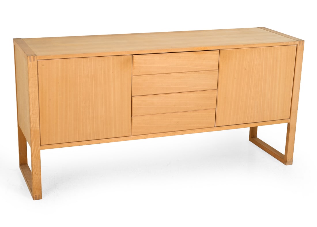 ANSAGER MOBLER DANISH BEECH SIDEBOARD C. 1970S: Marked to backside. Beech with exposed joints and push to open cabinets and drawers. Denmark, circa 1970s. Dimensions: H 33 " x W 67 " x D 19.5 " Condition: Fading/discoloration. Watermarks to top &