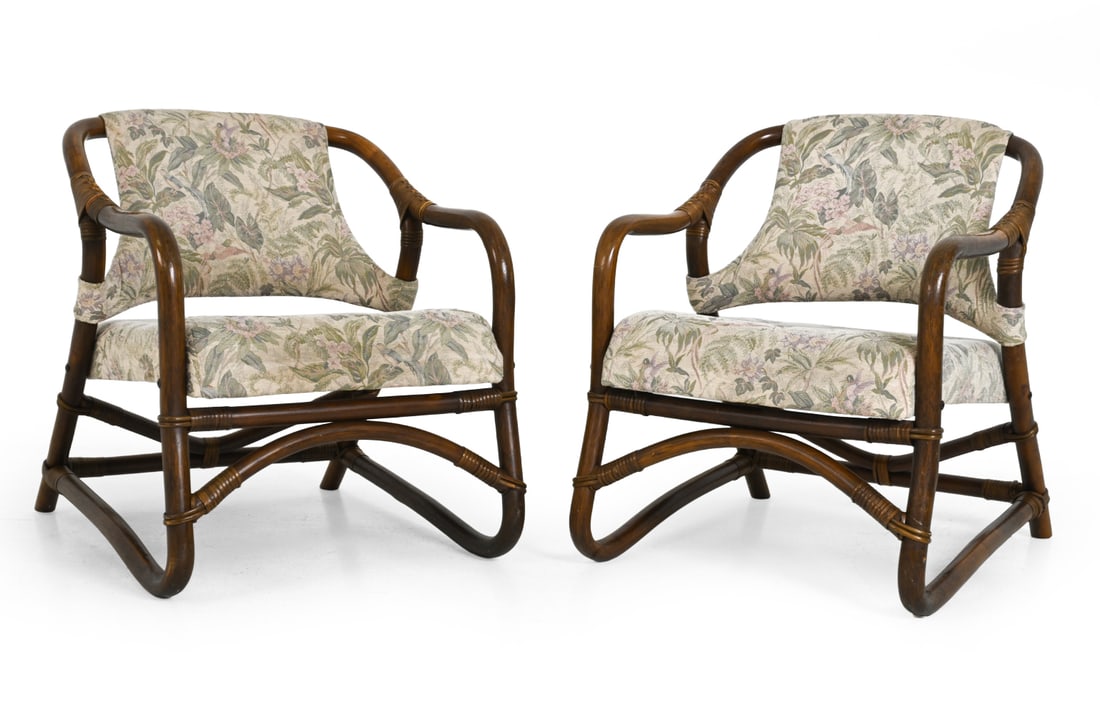PAIR ERIK ANDREASEN FOR SIKA BAMBOO LOUNGE CHAIRS: For Sika mobler. Bamboo frame with rattan detail and flower-pattern upholstery. Apparently unmarked. Denmark, Circa 1970s. Dimensions: H 30" x W 25" x D 29.25" x 17.25" Condition: Scuffs to arms.