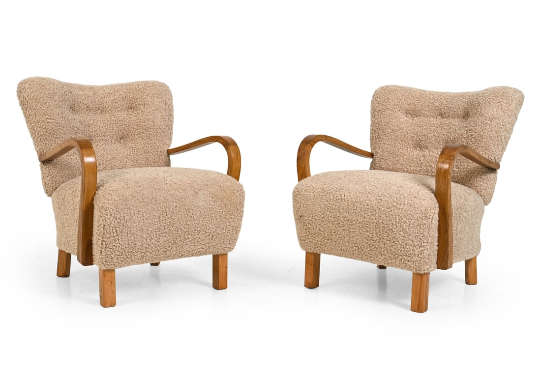 PAIR OF JINDRICH HALABALA "H-237" LOUNGE CHAIRS: Oak frame with boucle upholstery. Apparently unmarked. Czechoslovakia, circa 1940s. Dimensions: H 30.5 " x W 25.5" x D 30" x SH 19" Condition: Recently Reupholstered, Sun fading and discoloration to a