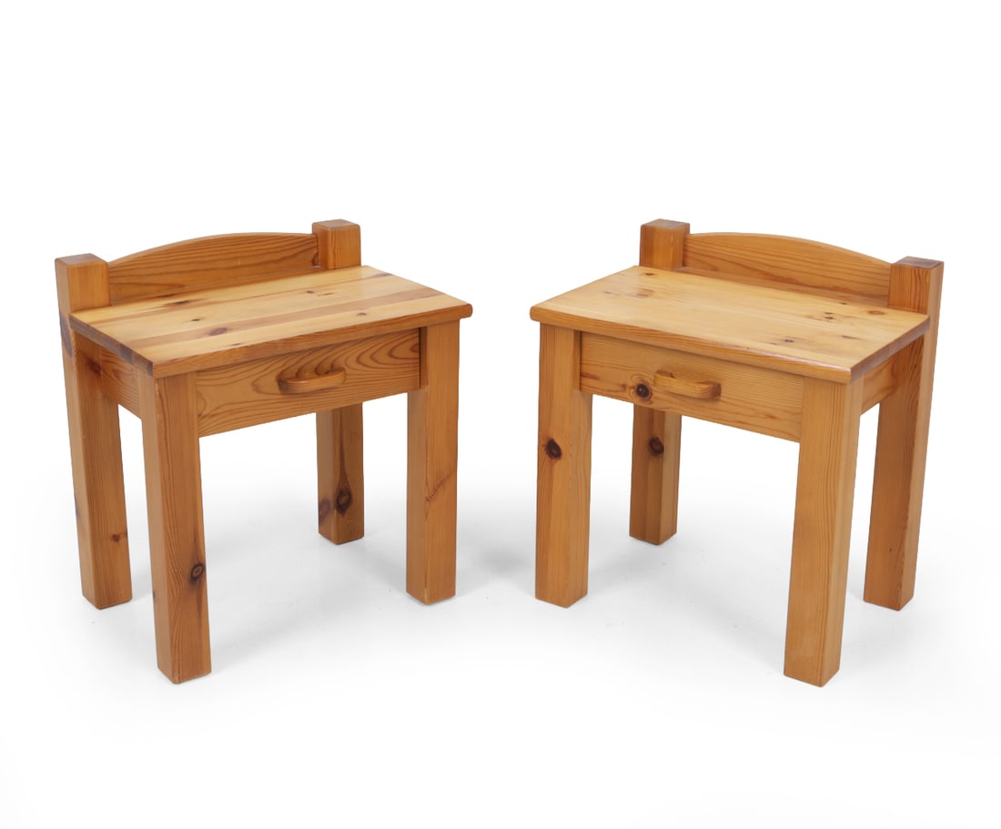 PAIR OF SCANDINAVIAN PINE NIGHTSTANDS C. 1970S: Pair of pine nightstands with one drawer each. Scandinavian, circa 1970s. Dimensions: H 19" x W 17.25" x D 12.25" Condition: Light surface wear and rubs consistent with age and use. Stress crack to