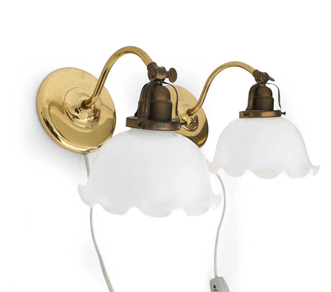 PAIR OF IVARS SWEDISH GLASS & BRASS WALL SCONCES: Brass with milk glass ruffled edge lampshade. Marked inside. Sweden, circa 1960s. Dimensions: H 9" x W 7" x D 11.25" Condition: Scuffs and patina to brass. Wiring untested. Cords cut. Wear consistent 