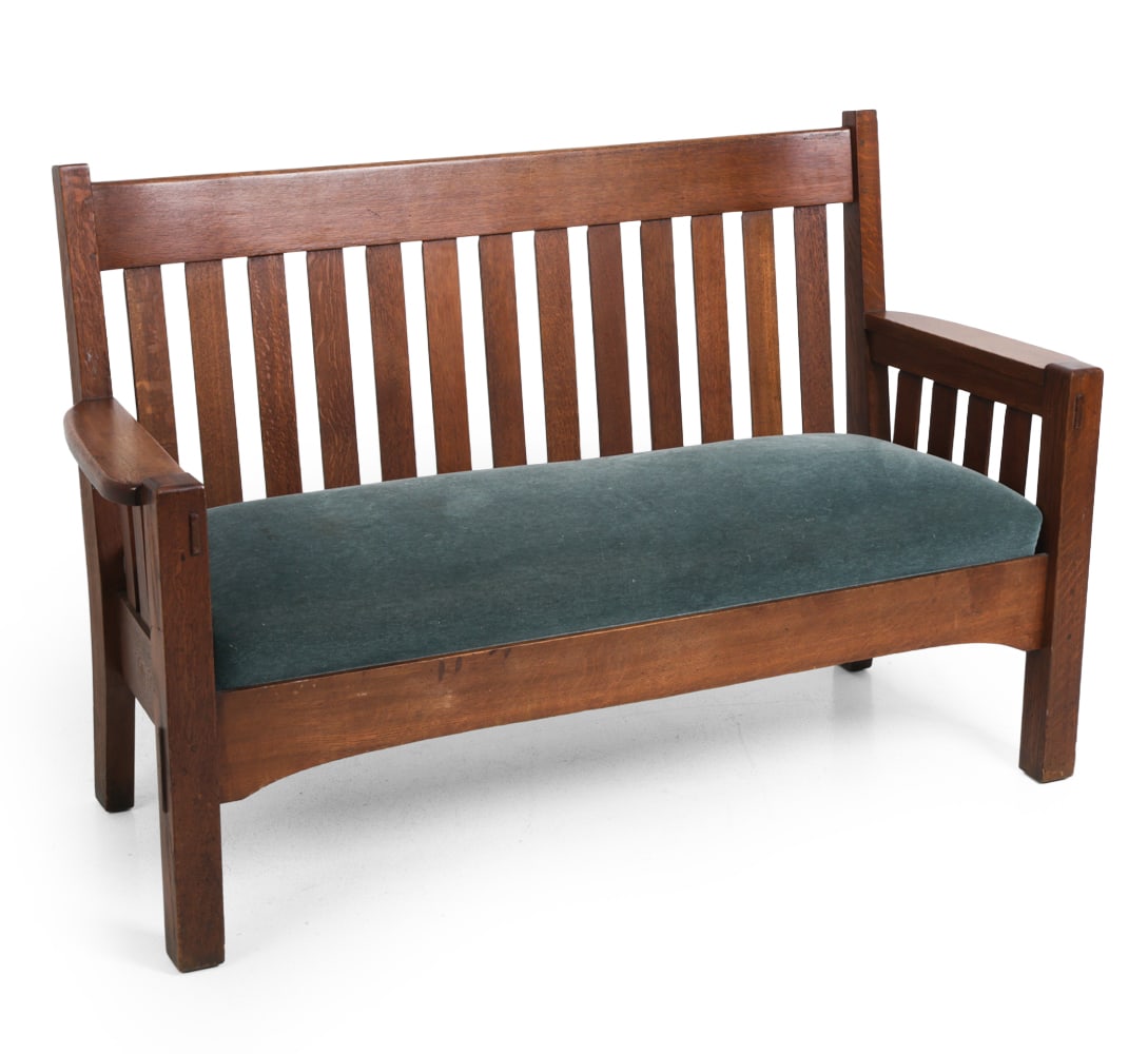 HARDEN FURNITURE MISSION OAK & MOHAIR BENCH: Oak with slatted frame and mohair upholstery. Apparently unmarked. Early 20th century. Dimensions: H 38.25" x W 59.75" x D 23" x SH 18" Condition: Wear consistent with age and use. Scuffs, rubs,