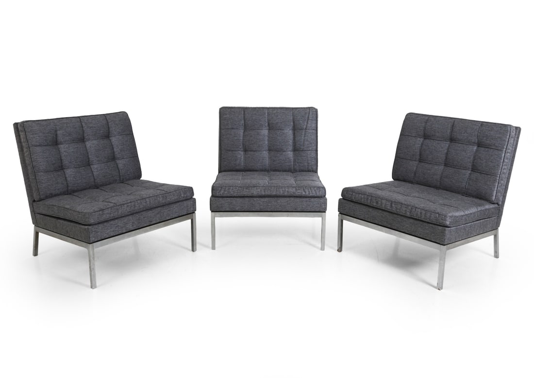 (3) FLORENCE KNOLL MODEL 65 LOUNGE CHAIRS 1970S: (3) Model 65 modular armless slipper chairs designed by Florence Knoll for Knoll Associates. Gray upholstery and chrome-plated steel frame. Marked underneath. Circa 1970s. Dimensions: H 31.25" x W 28"