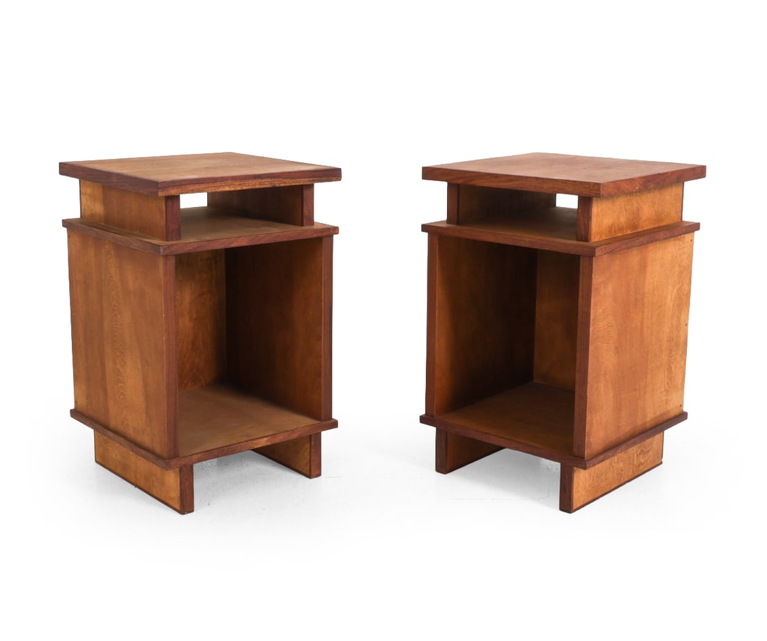 PAIR OF DECO STYLE WALNUT SIDE TABLES: Walnut with geometric two tier design. 20th century. Dimensions: H 27.25''x W 17''x D 17'' Condition: Discoloration. Wear consistent to age and use. Fading, watermarks, minor soiling spots, nicks,