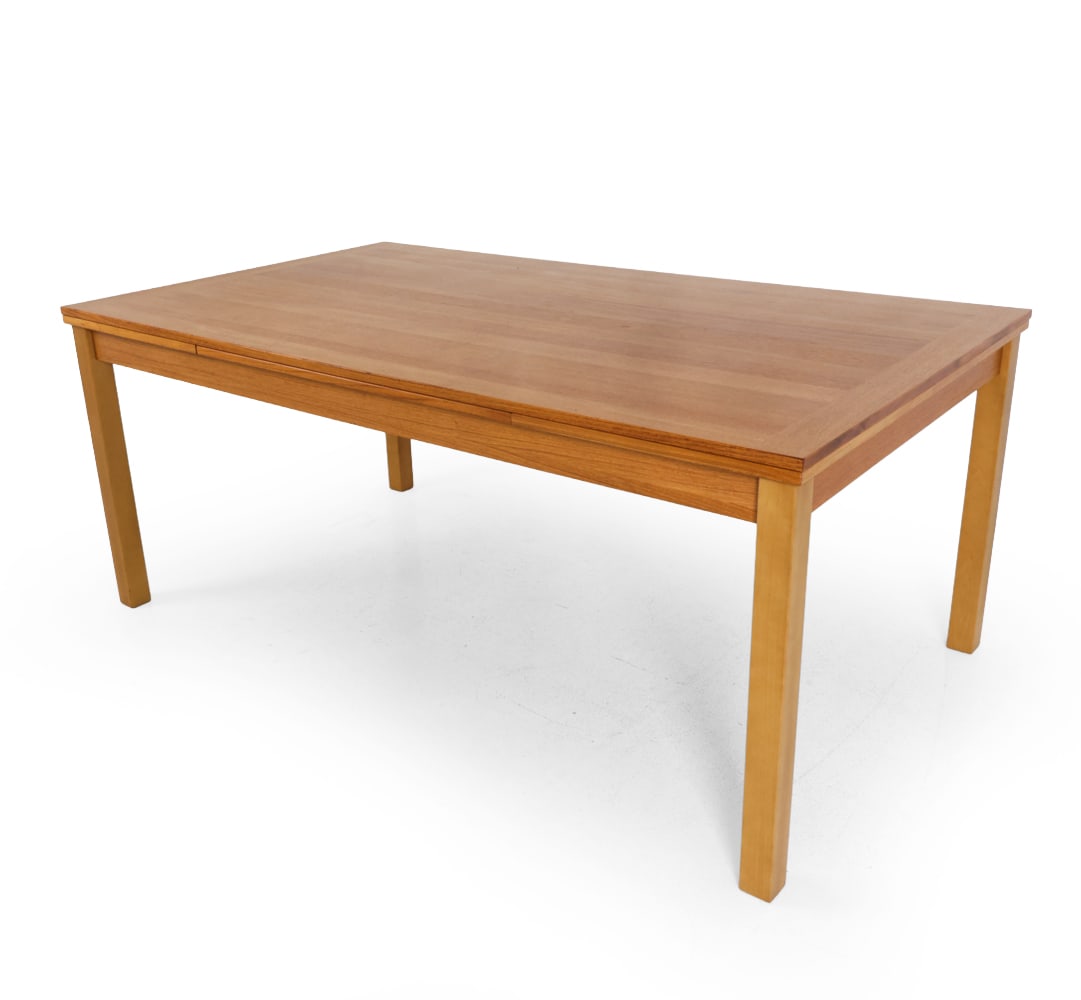 ANSAGER DANISH OAK EXTENDING DINING TABLE: Two pull out leaves. 20th century. Dimensions: H 31 " x W 72 " x D 41.5 " Condition: Scuffs and scratches. Areas of discoloration. Wear consistent with age and use.