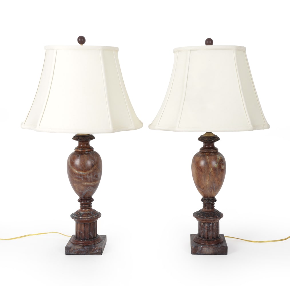 PAIR OF ALABASTER TABLE LAMPS: Contemporary, Carved in baluster shape with floral relief pattern at top and bottom. Brass top lighting fixture and cream shade. Dimensions: H 32.25" x W 17.25" Condition: Light nicks. Wiring untested