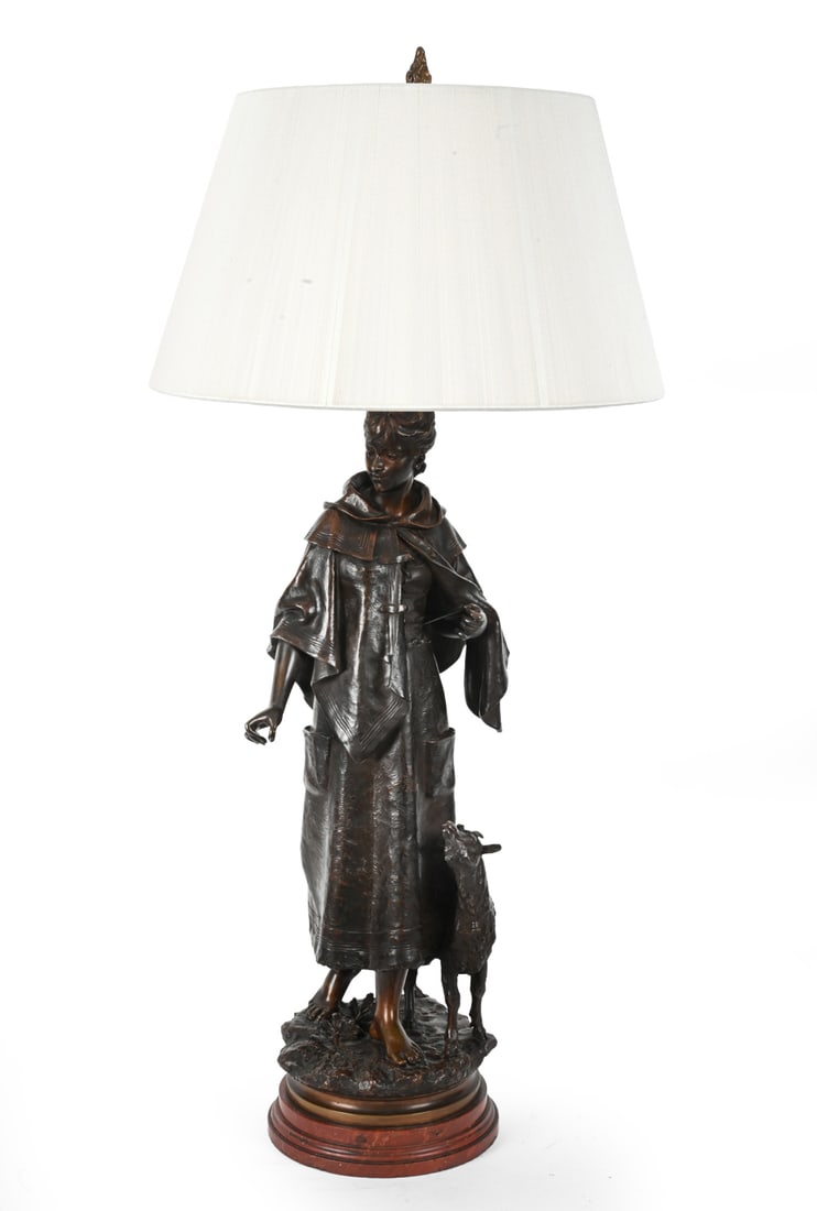 EUTROPE BOURET (FRENCH 1833-1906) BRONZE SCULPTURE: "Fileuse a la chevre" bronze sculpture lamp. Signed to base. Dimensions: H 40" x Dia 19" Condition: May be missing a staff in the hand of the Shepard. Wear consistent with age and use. Previously in