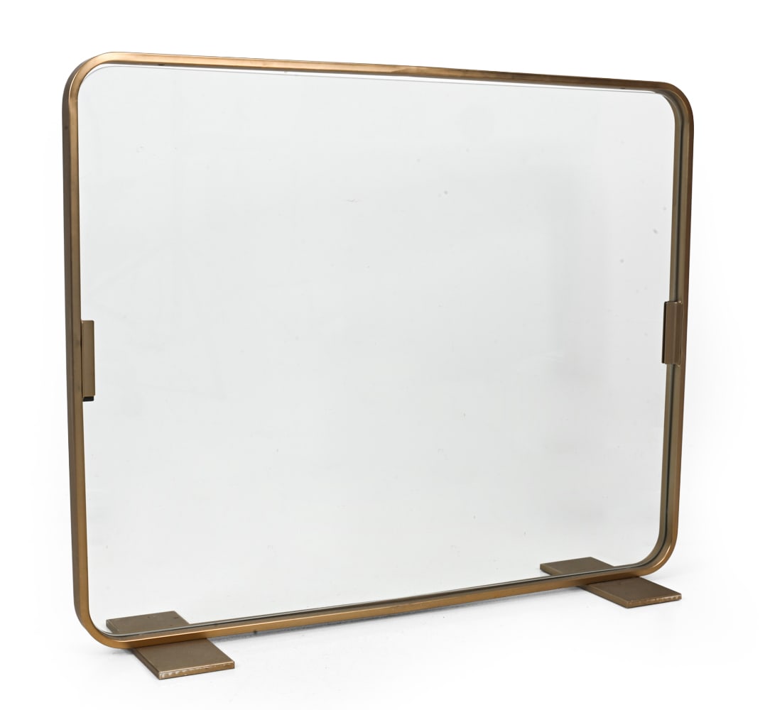 GLASS FIREPLACE SCREEN: Brushed brass finish frame with glass pane center. 20th century. Dimensions: H 31.5" x W 39" x D (of base) 9.5" Condition: Scuffs, scratches, wear of finish, and slight oxidization by bottom. Wear