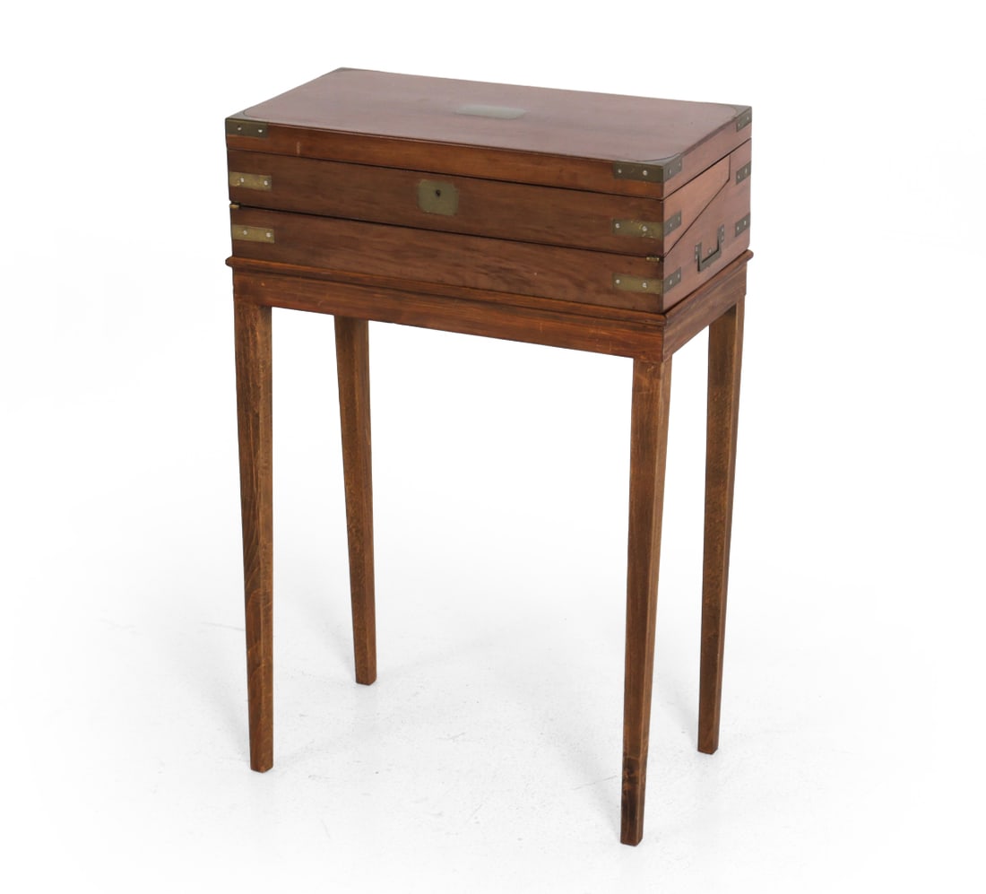 ANTIQUE ENGLISH MAHOGANY LAP DESK: No key included. Circa 19th century. Dimensions: H 30.75" x W 20" x D 10.25" Condition: Scratches, scuffs, watermarks, wear of finish, and discoloration. Interior table lining is peeling. Wear