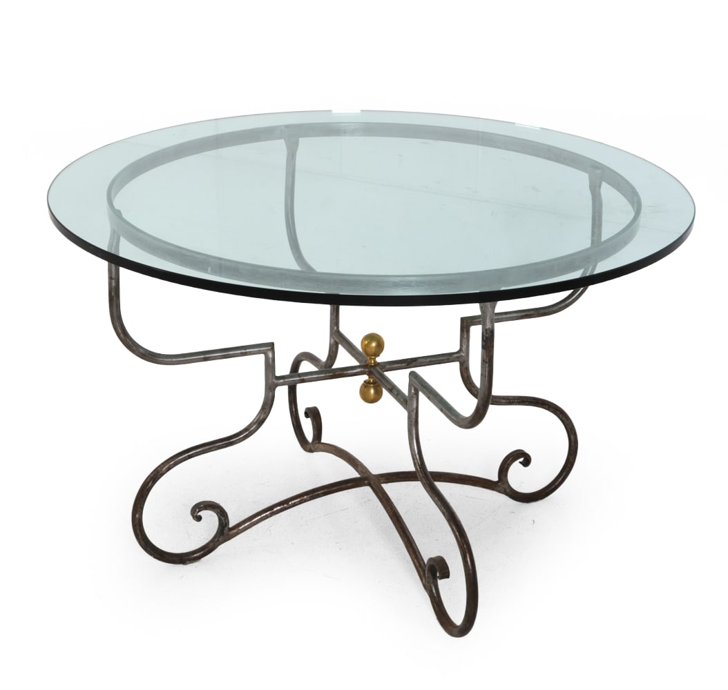 MAISON JANSEN DIRECTOIRE STYLE FRENCH TABLE: Brushed steel frame with brass sphere details and glass top. Dimensions: H 30" x W 48" Condition: Patina to metal and scratches to glass surface. Wear consistent with age and use, including some scuff