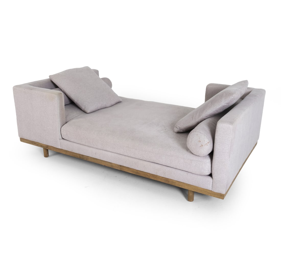 FOUR HANDS BRADY TETE A TETE CHAISE LOUNGE SOFA: From the Kensington Collection. Two loose pillows and two matching bolster pillows. Marked and dated 2022 underneath. Dimensions: H 29" x W 84.25" x D 48.25" x SH 17" Condition: Holes as shown to upho