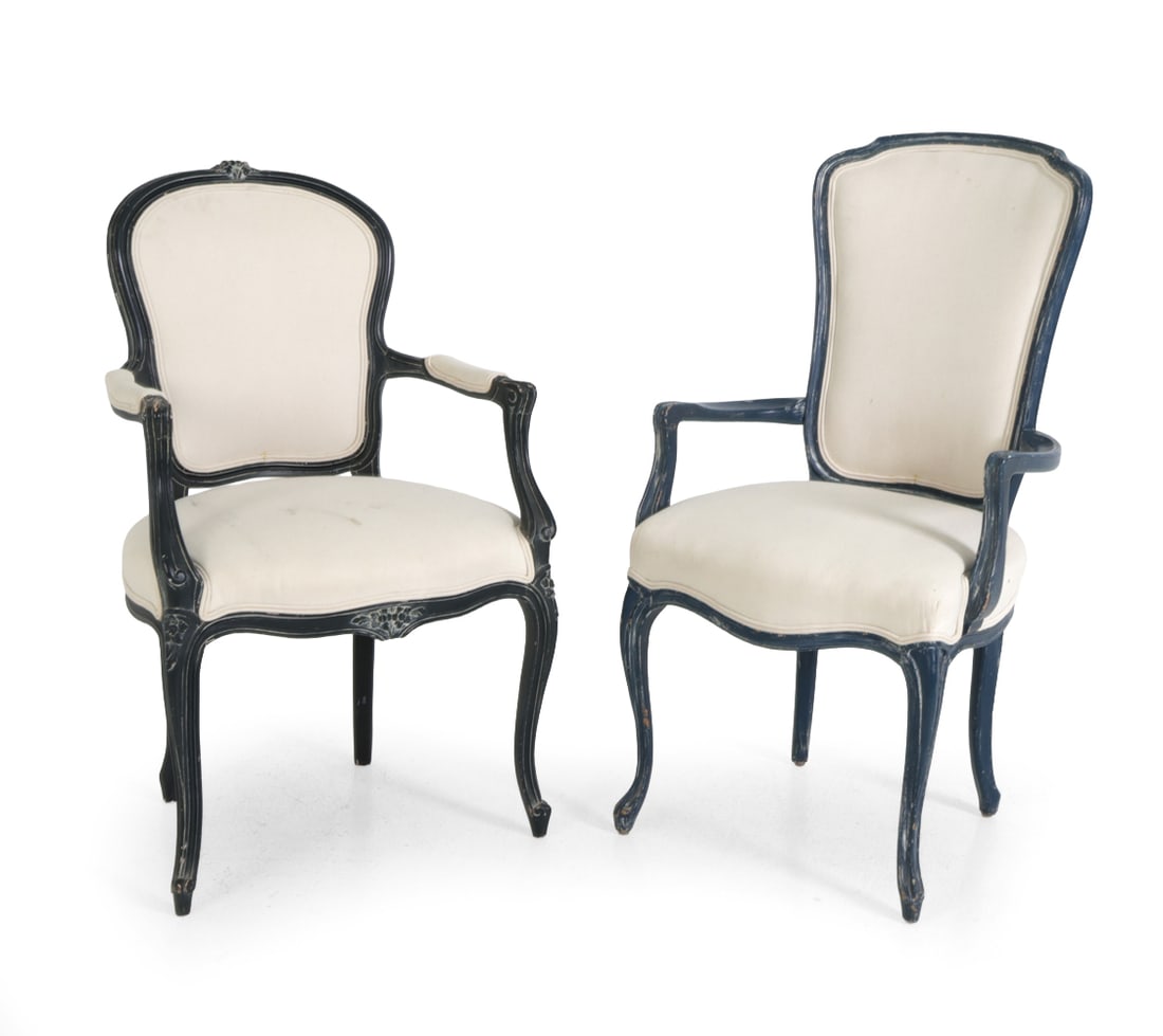 (2) LOUIS XV-STYLE ARMCHAIRS: Carved frames and white linen upholstery. One with distressed navy color and another with dark tone finish. 20th century. Dimensions: (Taller) H 43" x W 23" x D 19" x SH 19", H 39" x W 23" x D 19.5" x