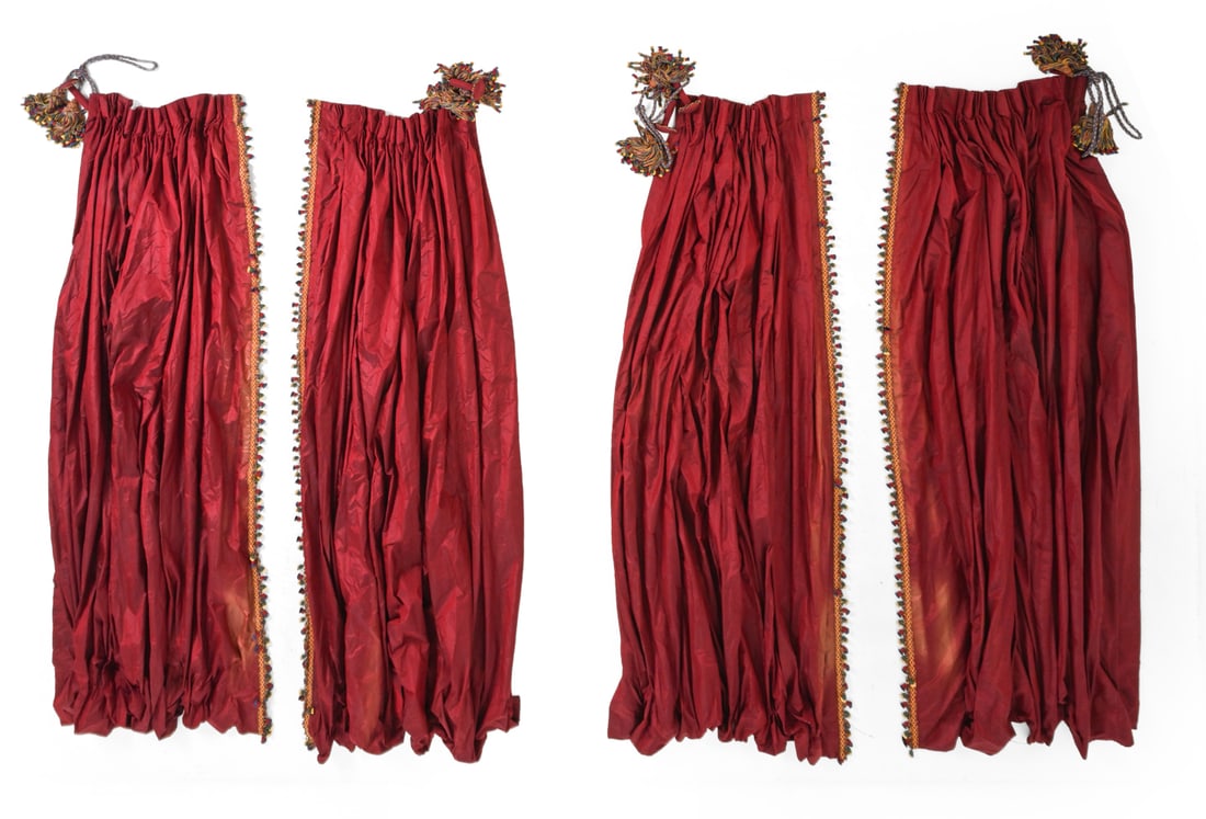 VICTORIAN STYLE DRAPERY GROUPING: (4) Drapery curtains. Featuring multicolor tassel accents. Dimensions: (One) H 112'' x W 44'' Total width: 176" Condition: Minor discoloration. Sun faded. Wear consistent with age and use.