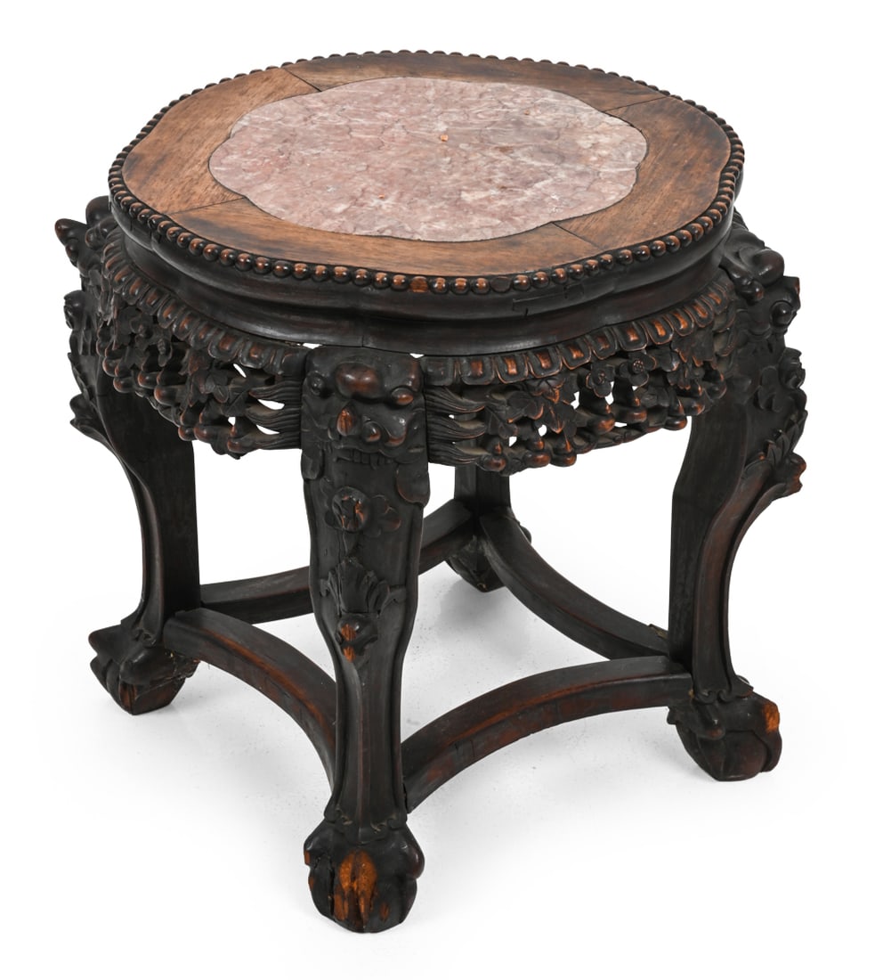 ANTIQUE CHINESE WOOD & MARBLE SIDE TABLE: Elaborate floral carvings in wood with pink tone marble inset top and paw feet. Dimensions: H 18" x W 19.25" x D 16.25" Condition: Wear of finish and discoloration. Base pieces are loose and