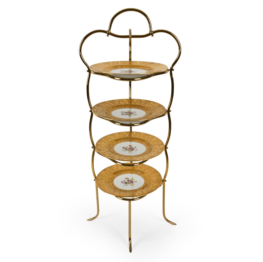 HUTSCHENREUTHER PORCELAIN PLATES W STAND: (4) Lorenz Hutschenreuther gilt rimmed porcelain plates painted by Eleanor Borrum. Gold tone four tiered plate stand. Marked underneath. Circa 1950s. Dimensions: (Stand) H 35" x W 13.5" Condition: Wea