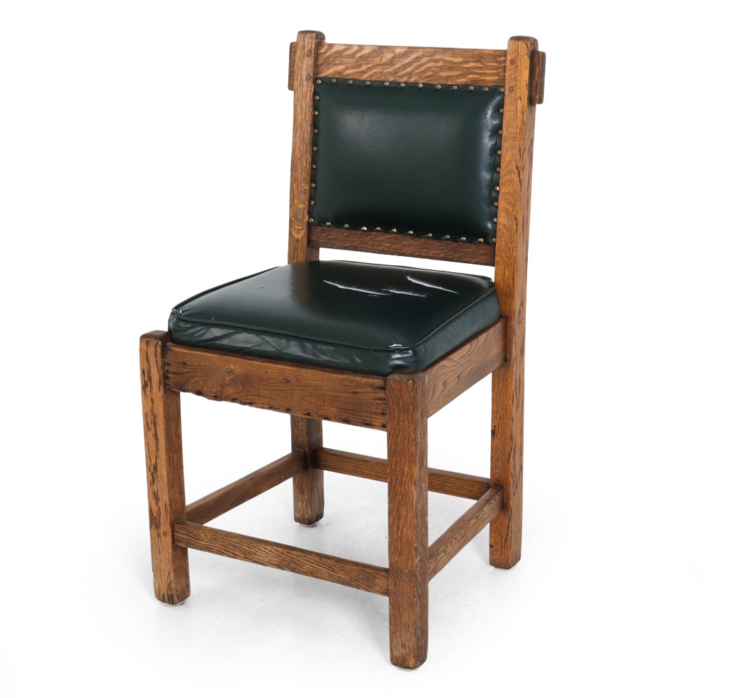 ARTS & CRAFTS MISSION OAK SIDE CHAIR: Early 20th century. Dimensions: H 36" x W 19.25" x D 18" x SH 20.25" Condition: Scuffs and heavy tear in seat upholstery, some loss to finish. Wear consistent with age and use.