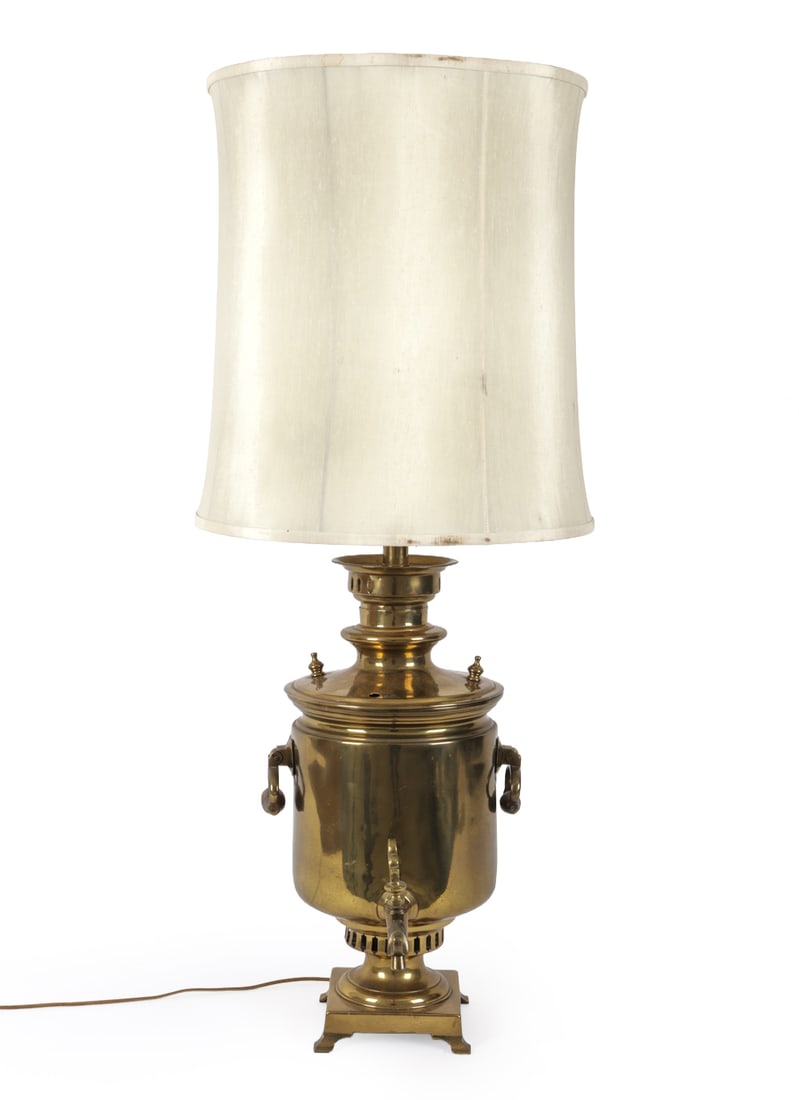 RUSSIAN BRASS SAMOVAR TABLE LAMP: Brass with wooden handles and spout. Late 19th century. Dimensions: H 41" x W 17.5" x D 17.5" Condition: Patina of brass and dings. Wiring untested. Wear consistent with age and use.