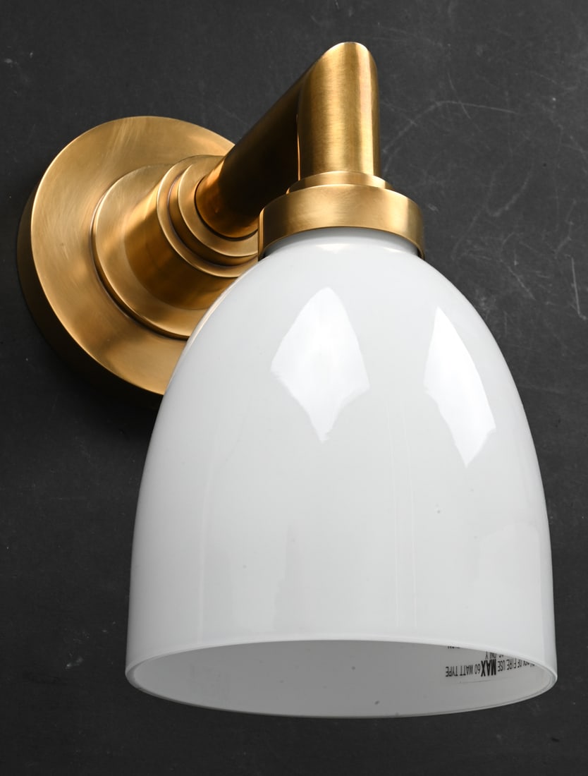 VISUAL COMFORT GLASS & BRASS WALL SCONCE: Apparently unmarked. Brass arm and white glass shade. Installation manual included. Dimensions: H 11.5" x W 9" x D 9" Condition: Wear consistent with age and use. Minor scuffs to brass. Wiring
