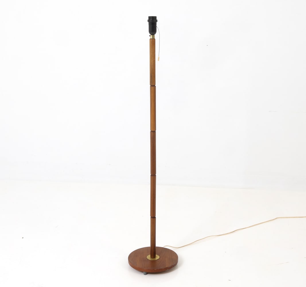 DANISH TEAK & BRASS FLOOR LAMP C. 1960S: Teak frame with pull-chain socket and brass details. Denmark, circa 1960s. Dimension: H 48.5" x Dia. 10" Condition: Not Tested, European Plug, Wear consistent with age and use.