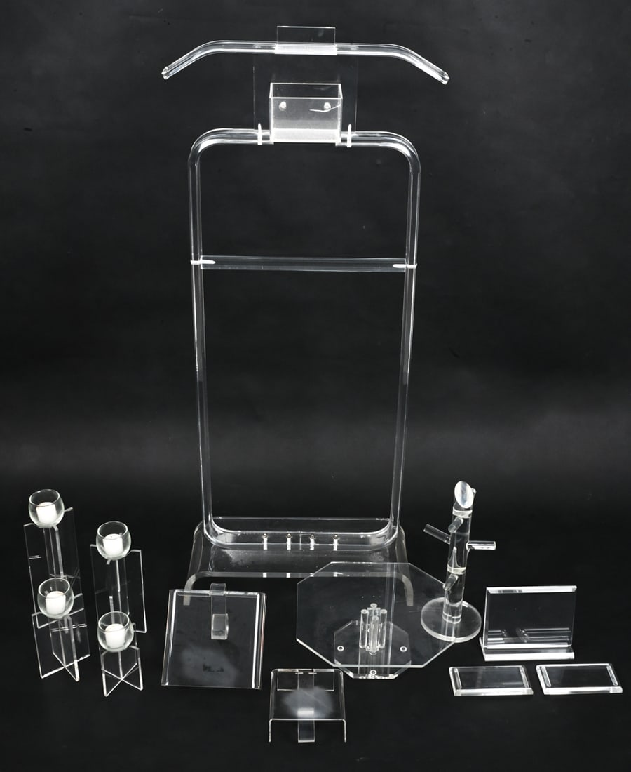 VINTAGE LUCITE GROUPING: (16) Items including a valet. Dimensions: (Largest) H 46" x W 19" x D 8" Condition: Wear consistent with age and use. Small crack to valet button holder. Minor rubs, soiling to accessories.