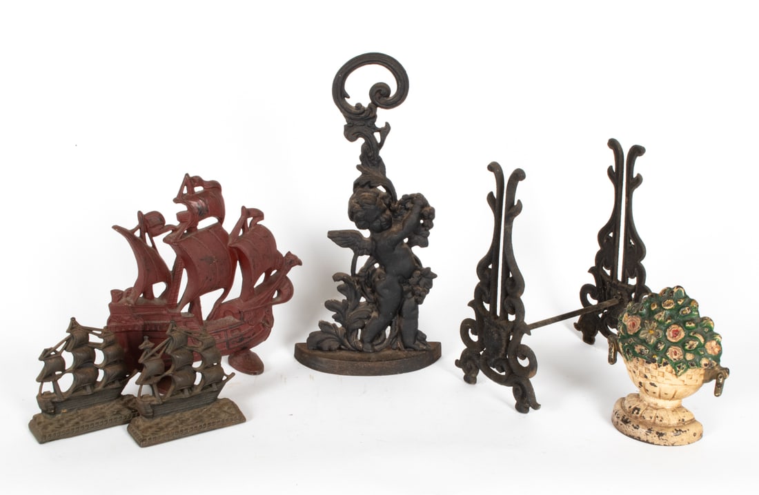IRON GROUPING INCLUDING DOOR STOPS: Dimensions: (Largest) H 17.5" x W 8.5" x D 2.75" Condition: Oxidation, rubs, surface wear consistent with age and use.