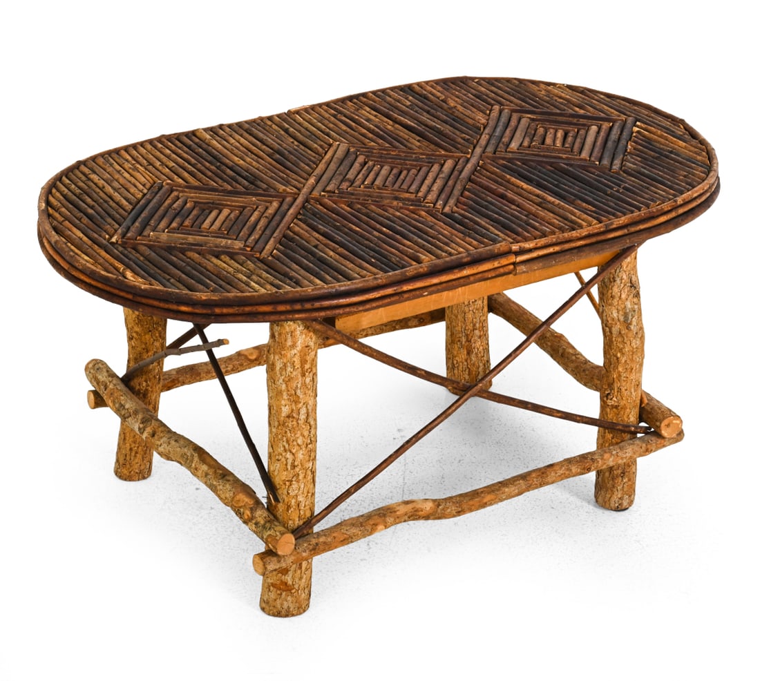 RUSTIC WILLOW & TWIG COFFEE TABLE: Wooden side table with diamond pattern in willow branches. Dimensions: H 16.75''x W 34.5'' x D 19'' Condition: Discoloration. Stained. Scuffed. Cracked. Thin willow branch side accents disconnected