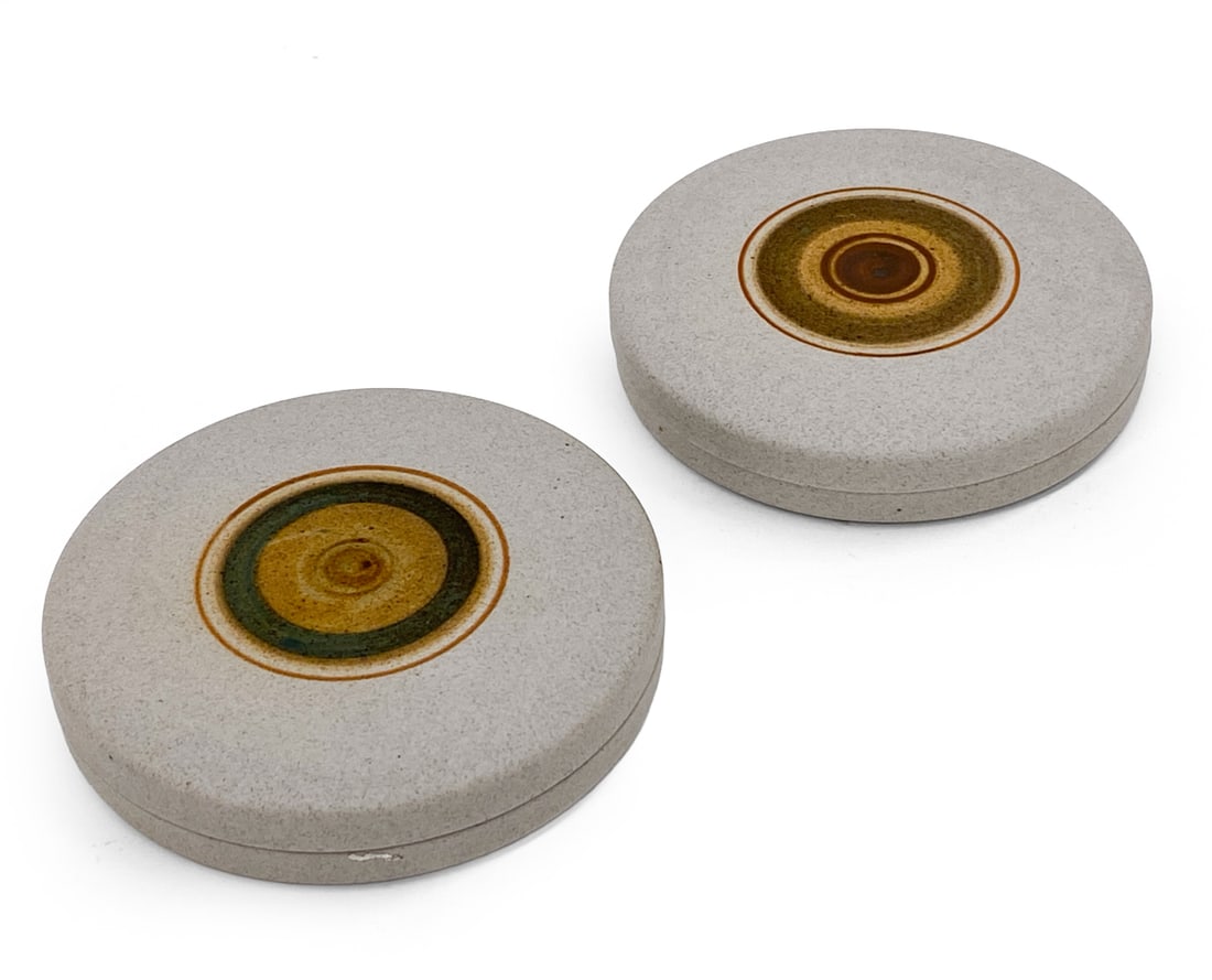 PAIR TOVE RAPPOLD FOR KNABSTRUP STONEWARE BOXES: Round ceramic boxes designed by Tove Rappold for Knabstrup. Marked to underside. Denmark, circa 1970s. Dimensions: H 1" x Dia 5" Condition: Wear consistent with age and use. Some minor residue to one 
