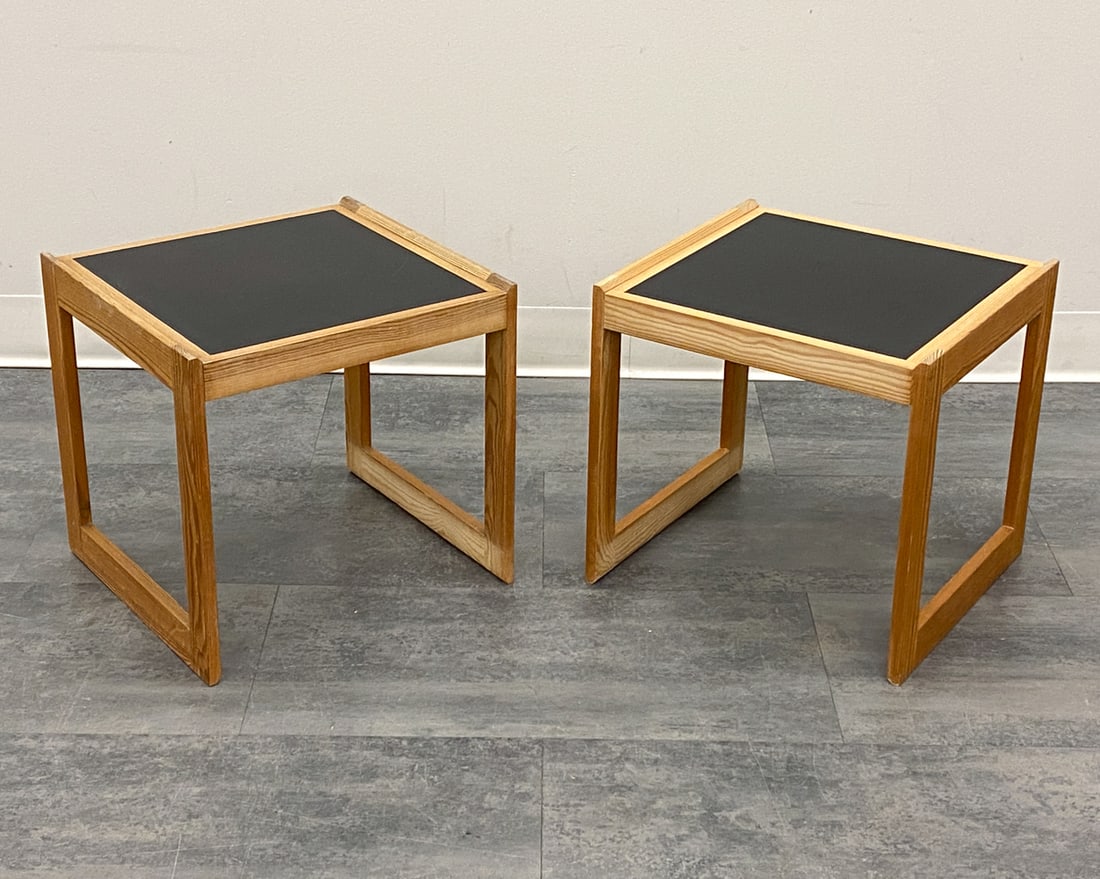 PAIR OF MOGENSEN STYLE DANISH PINE SIDE TABLES: Pine frame and black inlaid top. Denmark, circa 1960s. Dimensions: H 14.75" x W 15.25" x D 14" Condition: Wear consistent with age and use. Fading, nicks, minor scuffs.