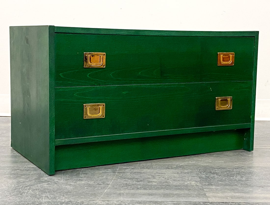 DANISH GREEN STAINED PINE LOW CHEST C. 1960S: Green stained wooden chest with brass pulls. Marked DBGM to pulls. Denmark, circa 1960s. Dimensions: H 16.5" x W 29.5" x D 16.25" Condition: Wear consistent with age and use. Some scuffs, minor rubs. 